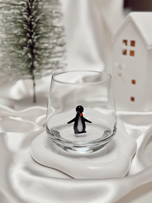 Handmade penguin figurine glass shown from a second angle