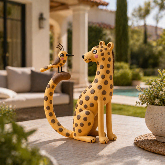 Handmade leopard and bird clay figurine