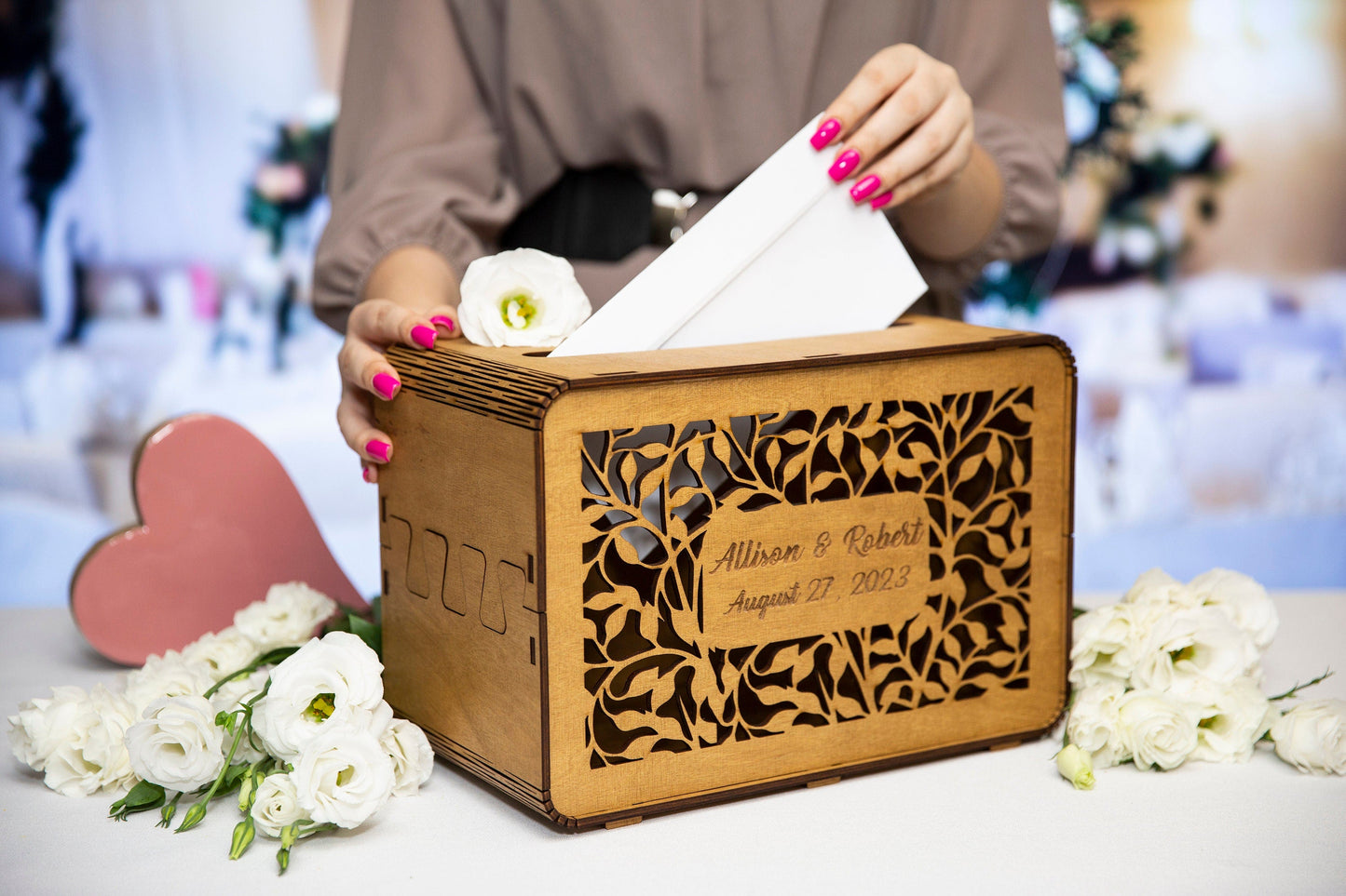 Wedding card box reception scene with envelope