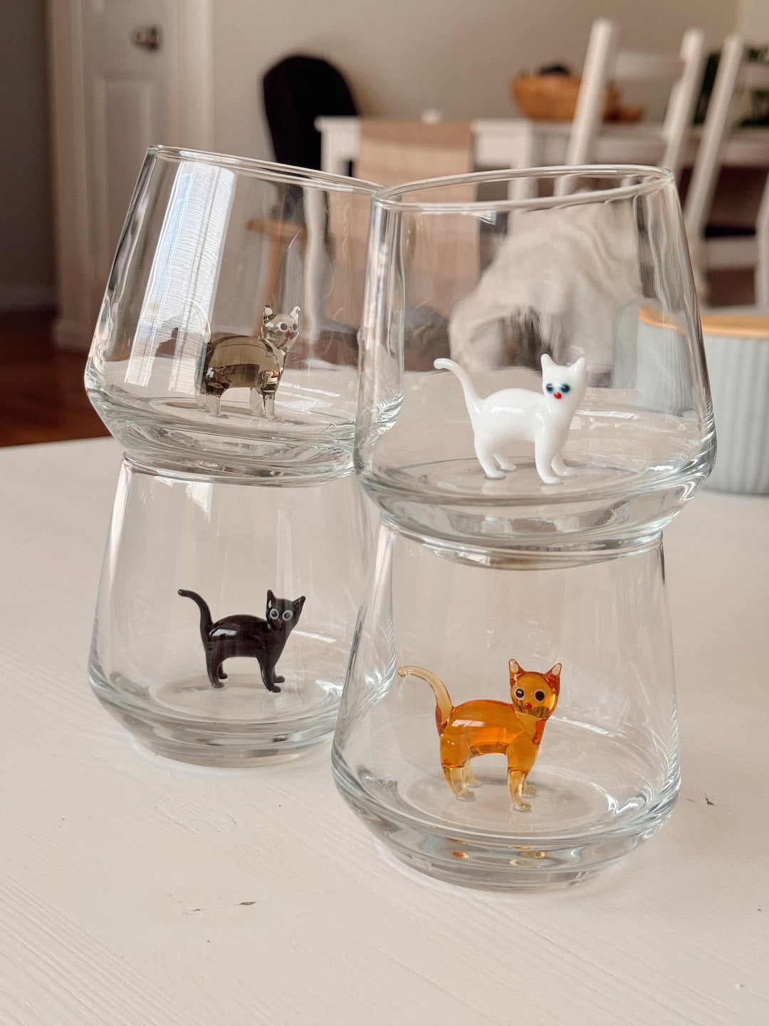 Cat figurine glass cup shown as a whimsical gift for cat lovers