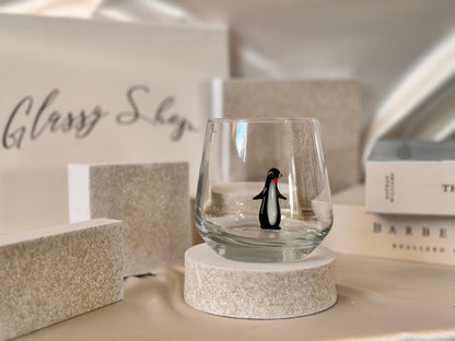 Clear handmade glass with playful penguin character detail