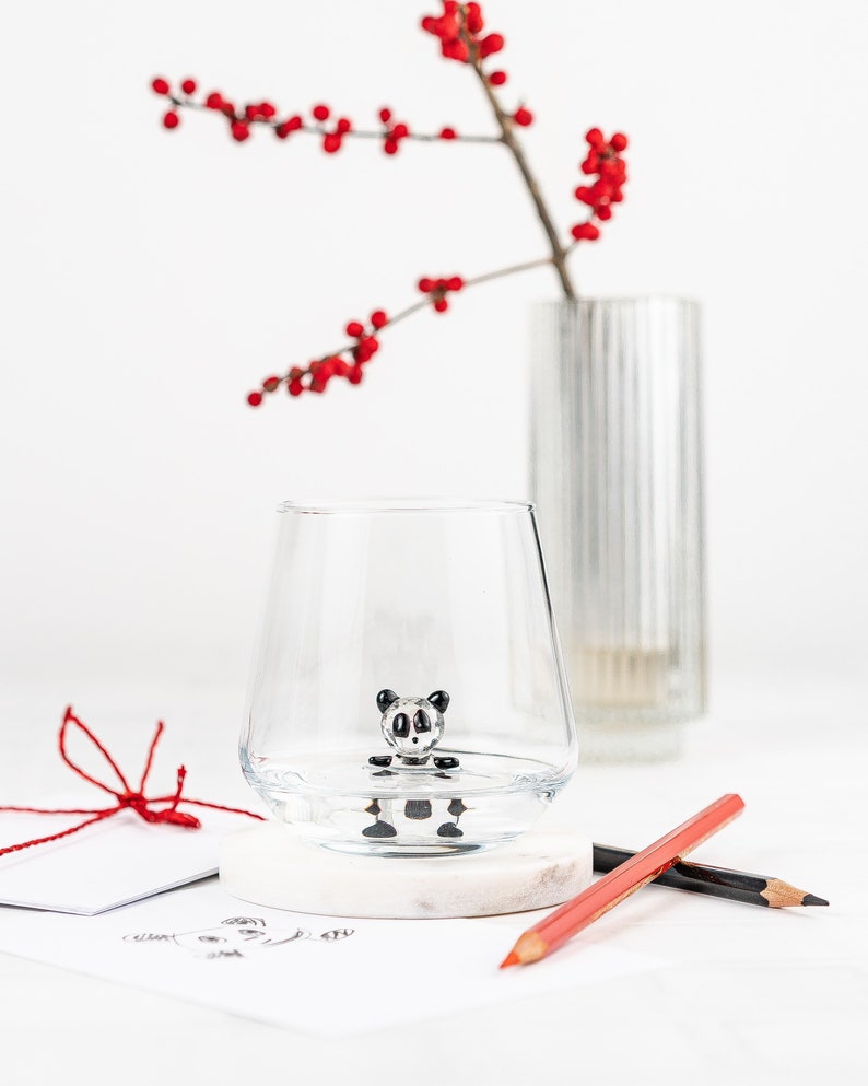 Cute panda drinking glass in a playful gift setting