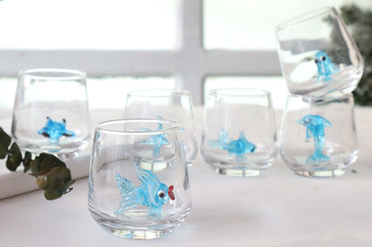 Colorful fish figurine inside a handmade glass