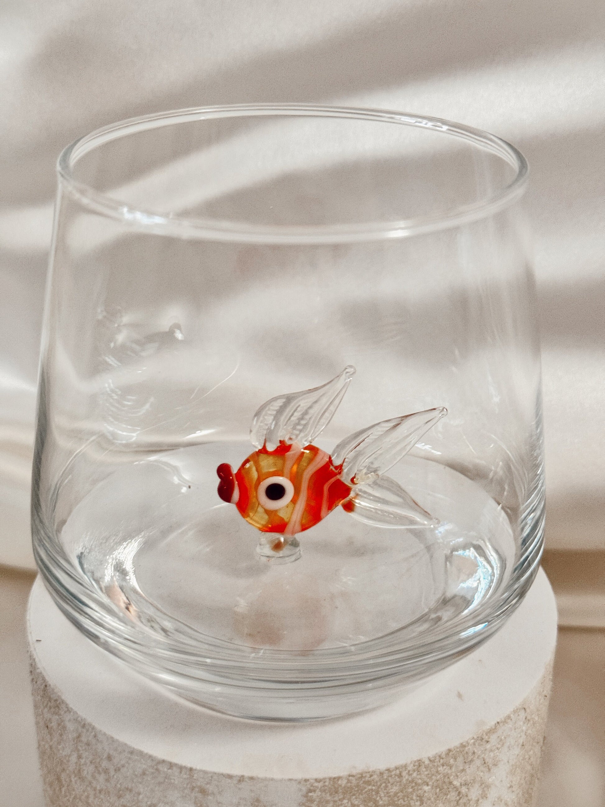 Purple fish figurine glass for coastal table decor