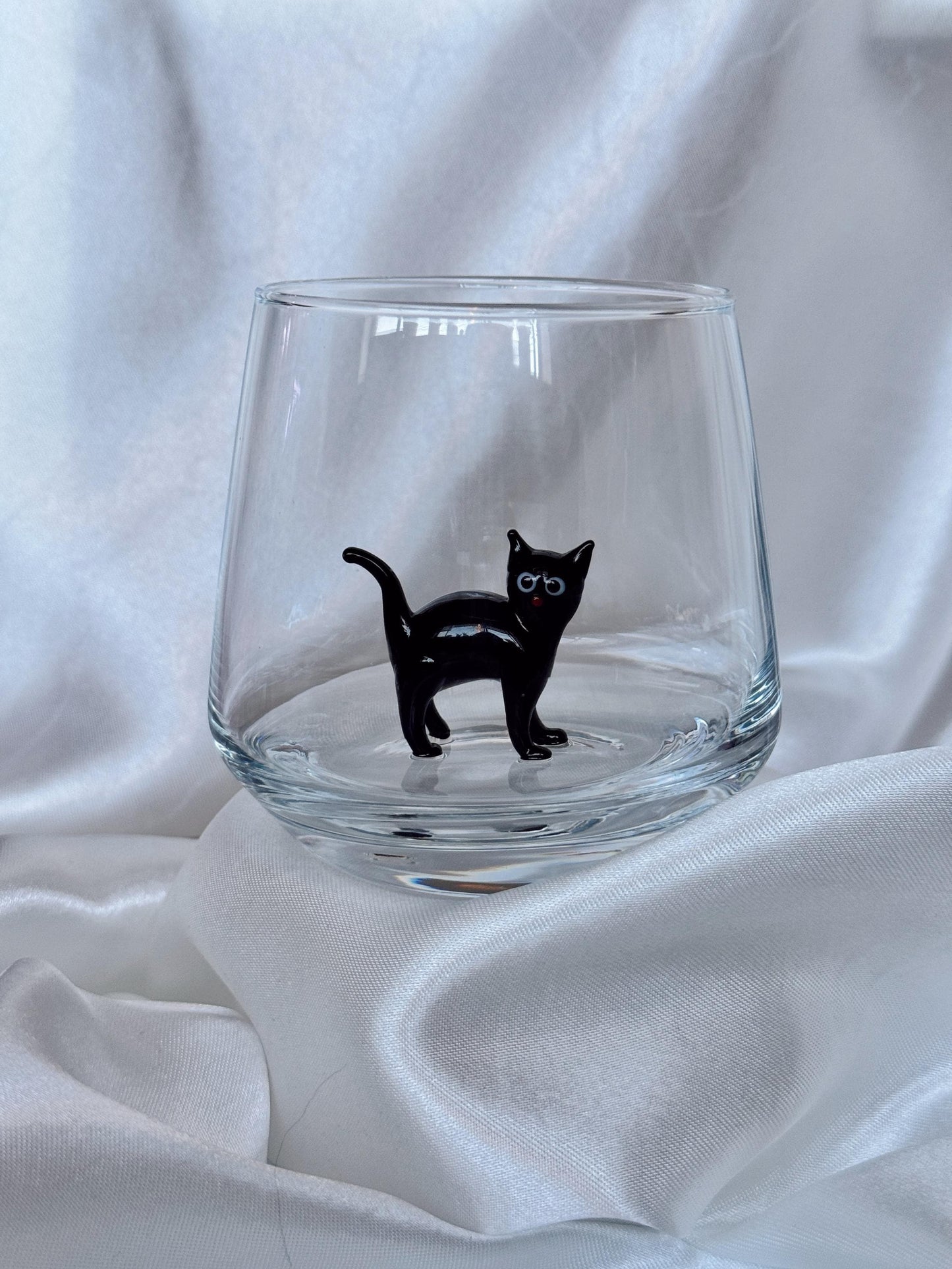 Handmade stemless glass cup with a three-dimensional cat figurine inside