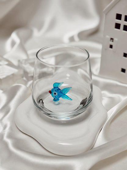 Colorful fish Murano-style glass shown as an ocean lover gift