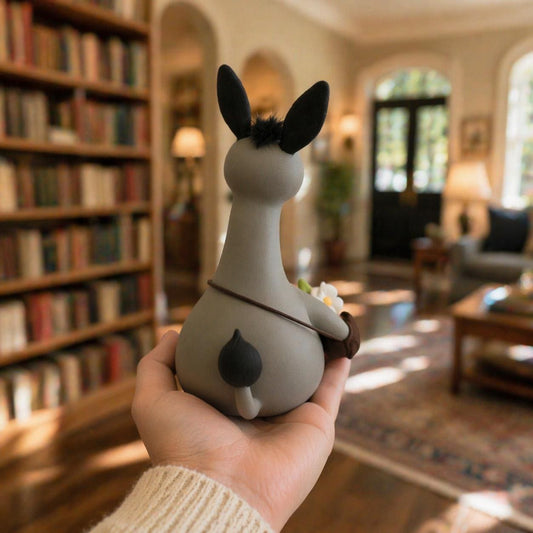 Handmade clay donkey holding flowers — image 2
