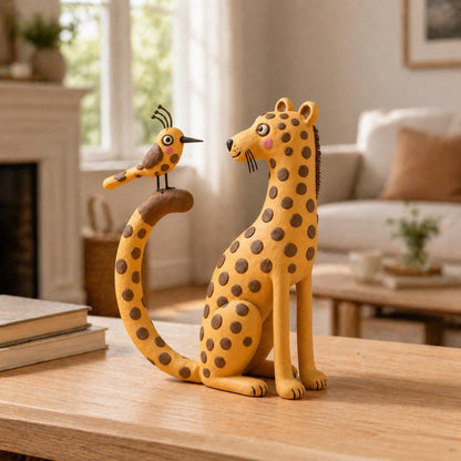 Handmade leopard and bird clay figurine