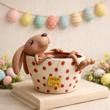 Handmade bunny in a polka-dot teacup clay figurine