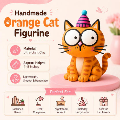 Orange cat clay figurine with striped party hat — original image 6