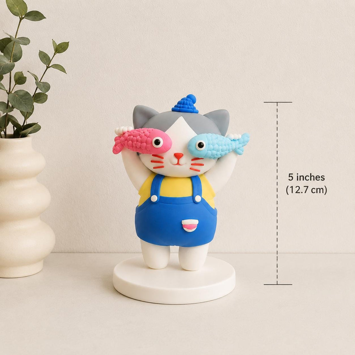 Handmade cat clay figurine holding pink and blue fish, image 4