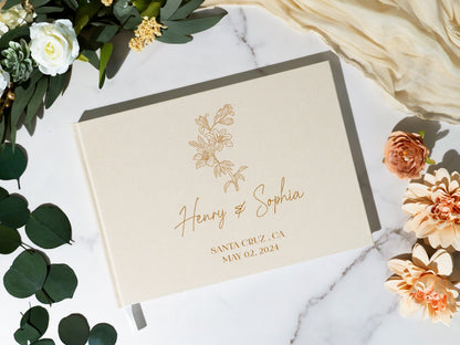 Personalized guest book displayed at a wedding reception